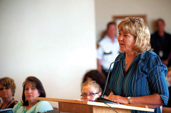 Gallup-McKinley County Humane Society Director Cosy Balok addresses the McKinley County Commissioners regarding animal control funnding cuts at the McKinley County Courthouse Tuesday. © 2011 Gallup Independent / Adron Gardner 